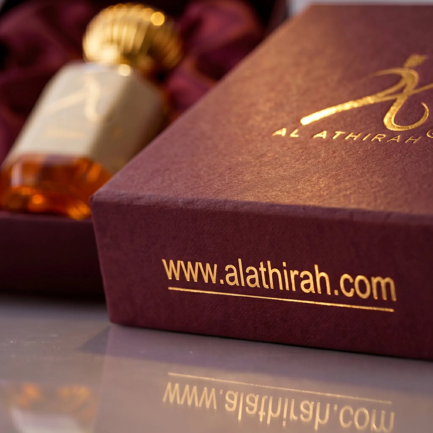 Close-up of Ishvara Modern Attar for Men & Women in a 12ml bottle, showcasing the sleek design and clear glass container.