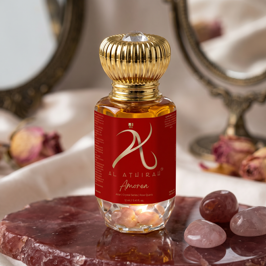 Crystal-infused Amoria premium attar bottle with intricate design, showcasing luxurious packaging and elegant presentation.
