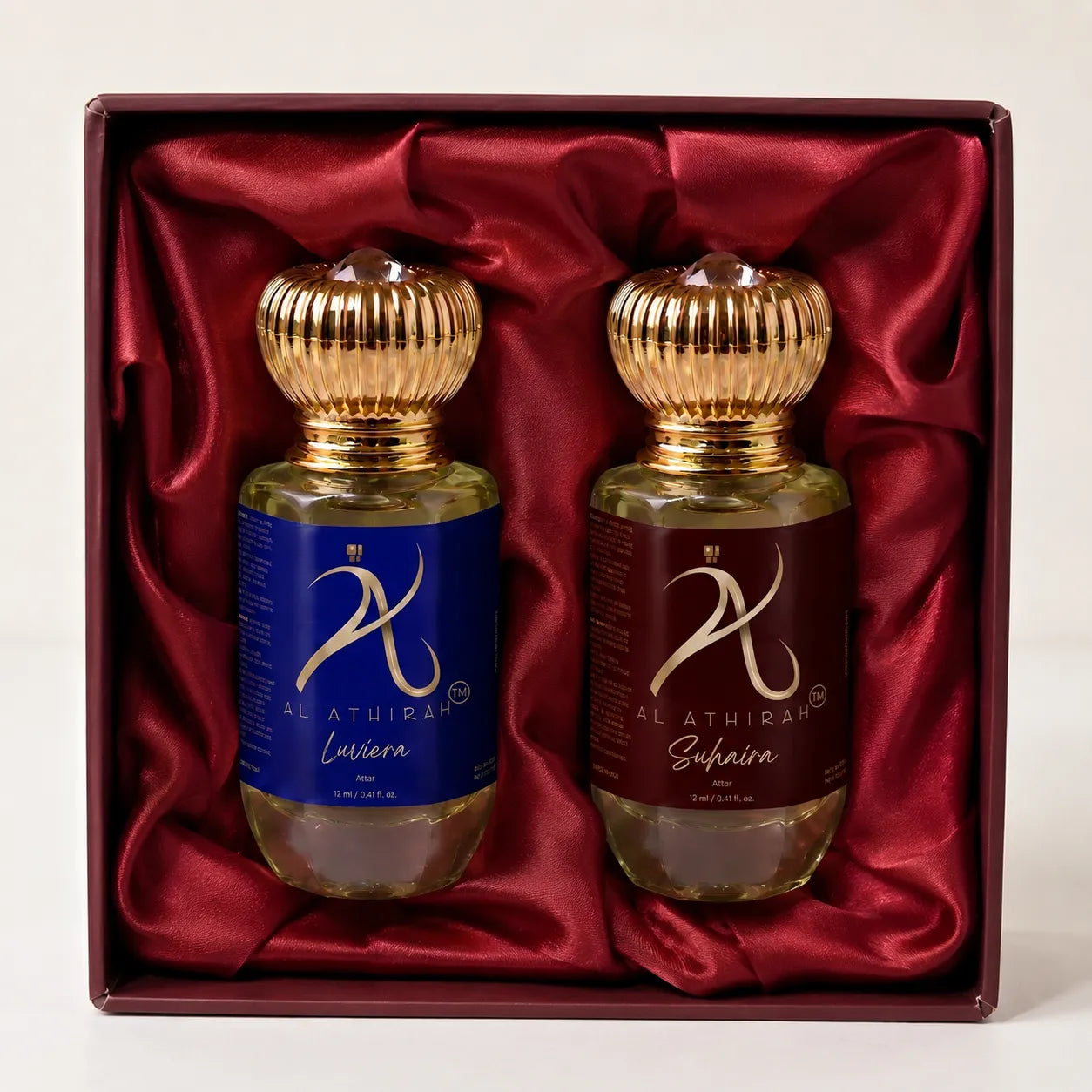 Assorted modern Attar perfume bottles in a set, featuring elegant glass containers with gold accents, ideal for all-purpose use.