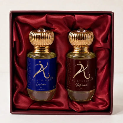 Assorted modern Attar perfume bottles in a set, featuring elegant glass containers with gold accents, ideal for all-purpose use.