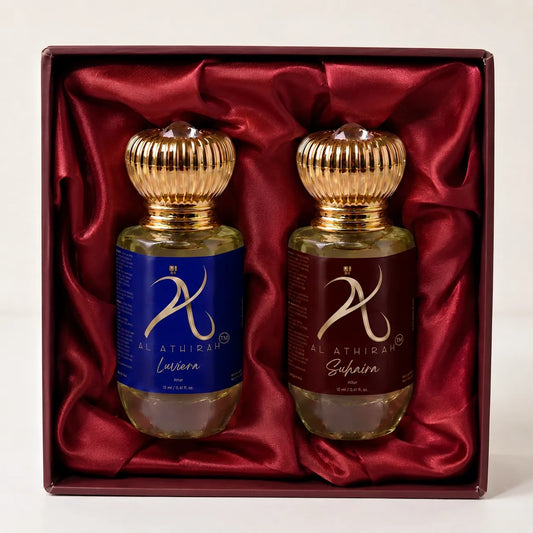 Assorted modern Attar perfume bottles in a set, featuring elegant glass containers with gold accents, ideal for all-purpose use.
