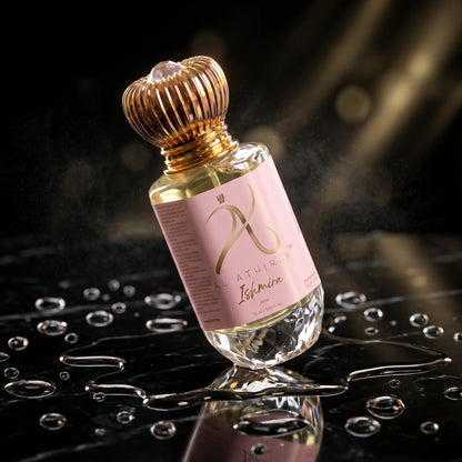 Ishmira Modern Attar for Men & Women in 12ml bottle, non-alcoholic, with a sleek glass container and elegant packaging.