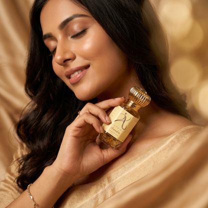 Anandria Crystal Infused Premium Attar by My Store in a luxurious glass bottle with intricate design, showcasing elegance and fragrance.