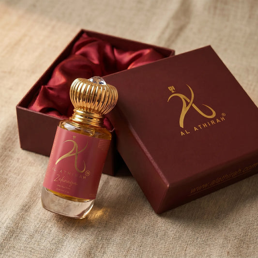 Modern Oud Attar for Women by Zehnaya in a 12ml bottle, non-alcoholic, featuring elegant glass packaging with a sleek design.