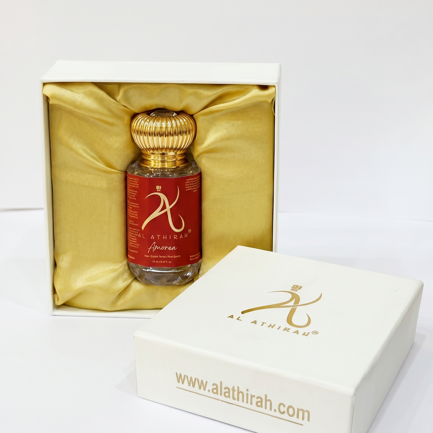 Crystal-infused Amoria premium attar bottle by My Store, featuring a decorative glass container with a cap and elegant design.