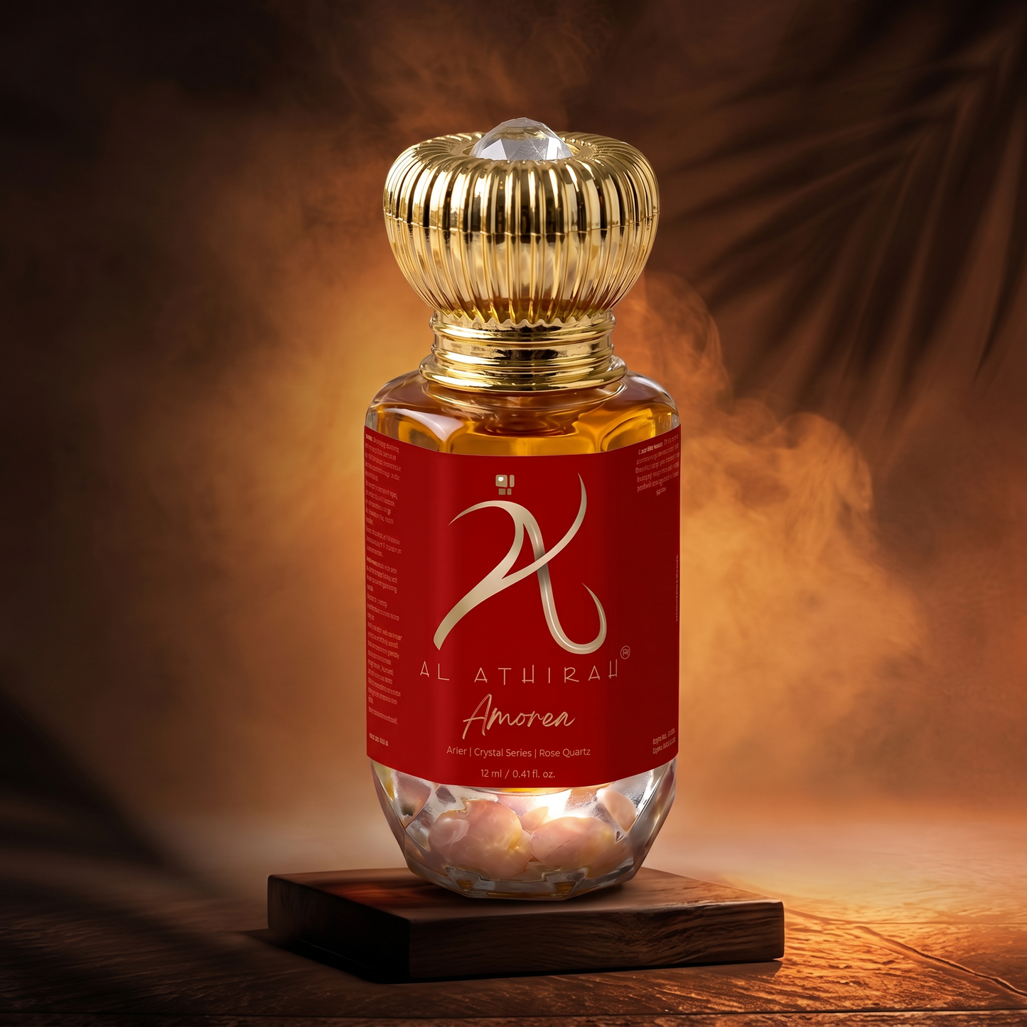 Amoria Crystal Infused Premium Attar bottle with intricate design, showcasing luxurious fragrance packaging and elegant branding.